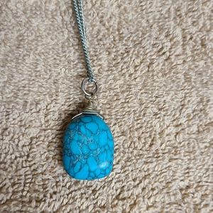 Turquoise pendent on silver chain
